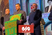 ورود پرچم مبارک حرم امام رضا(ع) به مراسم هفتمین روز شهدای خد...