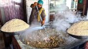 (ویدئو) پخت ۲۶۵ کیلوگرم قابلی پلو با گوشت به روش آشپز مشهور خیابانی پاکستانی