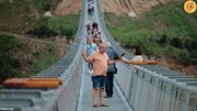 (تصاویر) طولانی‌ترین پل معلق دو طرفه جهان بازگشایی شد