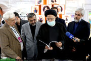 بازدید شهید آیت الله رئیسی از سی و چهارمین نمایشگاه کتاب تهران