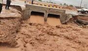 آسیب سیلاب به پل ورودی شهر راور