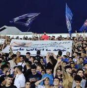 بنر هواداران داماش علیه «درویش» مدیرعامل پرسپولیس