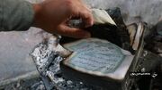 قرآن‌هایی که از میان شعله‌های آتش سالم بیرون آمد + فیلم و عکس