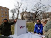 At gunpoint, Ukrainians in occupied regions vote in Russia’s election