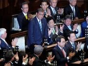 Japan’s PM Ishiba survives parliament vote, to lead minority government