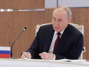 Putin threatens Ukraine with new missile as Russian barrage hits power grid