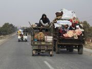 Thousands flee Syria’s Homs as opposition forces advance on key city