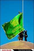 پرچم گنبد و پوش ضریح مطهر امام رضا(ع) تعویض شد