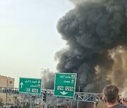 آتش سوزی در بازار جنت آباد تهران (+عکس و فیلم) / آتش در سوله 2 هزار متری / آتش نشانی: حریق، گسترده است