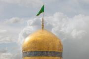 بیرق سبز رضوی بر فراز گنبد برافراشته شد
