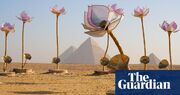 Giant flowers, a buried chariot and temples in the sand: the art show in the shadow of Giza pyramids