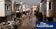 ‘I keep calling it a horror film’: Spaniards recount flooding as clean-up begins