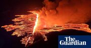 Iceland volcanic eruption: barriers appear to hold back lava outside town