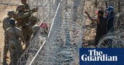 Texas troops clash with migrants over barbed-wire breach at US border