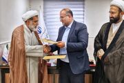 تصاویر/ امضای تفاهم نامه حوزه علمیه با سازمان بسیج اصناف، بازاریان و فعالان اقتصادی