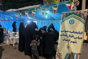بزرگداشت شهدای هفتم تیر در غرفه فرهنگی کتابخانه‌های عمومی آشتیان