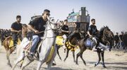 آیین سنتی نخل‌گردانی تاسوعا در کارچان برگزار شد