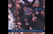 اقامه نماز آیت الله حکیم بر پیکر رهبر شهید انقلاب در نجف اشرف+ فیلم