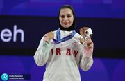 دختر وزنه بردار تاریخ ساز ایران: سه ماه با رویای مدال ناگویا خوابیدم/ هدف بزرگم المپیکی شدن است