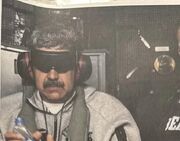 ترامپ تصویری از مادورو در حال انتقال به آمریکا را منتشر کرد