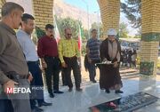 غبارروبی مزار شهید گمنام دانشگاه علوم پزشکی کرمانشاه به مناسبت آغاز هفته دفاع مقدس