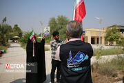 پرچم مقدس جمهوری اسلامی ایران در دانشگاه علوم پزشکی هرمزگان برافراشته شد