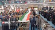 آیین برافراشتن پرچم ایران در محل گلزار شهدای رشت برگزار شد