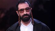 شعار نویسی روی دیوار خانه ایمان صفا