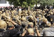 آیین سنتی 800 ساله گِل‌مالی روز عاشورا در شهرستان بن+فیلم