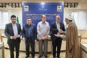 اهدای 25 سند مالکیت در نشست منطقه‌ای قانون الزام در همدان