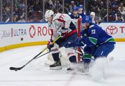 In T.J. Oshie’s 1,000th game, Capitals raise their level and beat the Canucks