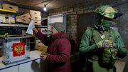 For Putin’s election in occupied Ukraine, voting is forced at gunpoint