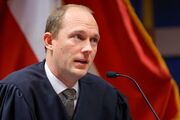 Georgia judge dismisses six charges in Trump election interference case